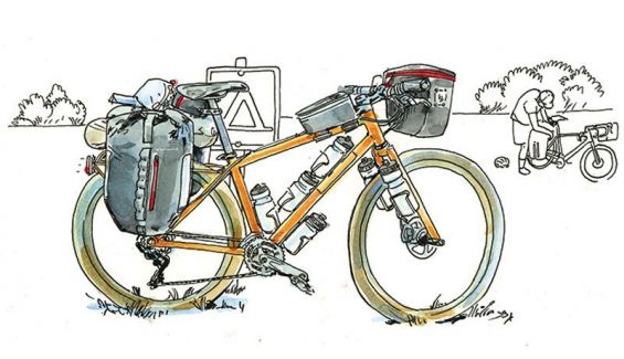 Bicicleta con alforjas